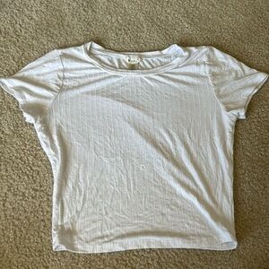 cute cropped white tee! Super stretchy from Bozzolo! Size L